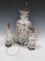 Three Chinese reproduction porcelain lamp bases, tallest 53cm