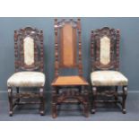 A pair of Carolean style oak armchairs; together with a caned back chair (3) Provenance: Heydon