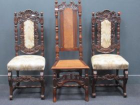 A pair of Carolean style oak armchairs; together with a caned back chair (3) Provenance: Heydon