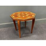 An octagonal inlaid occasional table 48 x 55 x 55cm