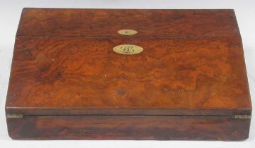 A late 19th century bur-walnut writing slope manufactured by ‘MECHI & BAZIN, MAKERS LONDON’ with a