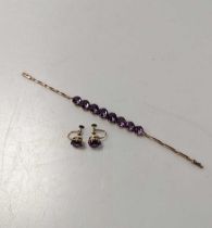 synthetic colour change corundum bracelet with a pair of earrings, stamped '9CT', gross weight 14.1g