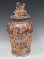 An Imari balluster vase and cover with Fo dog finial, 47cm high