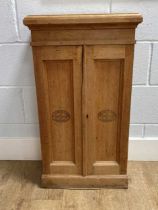 A pine two door cigar cabinet, 82 x 46 x 26cm