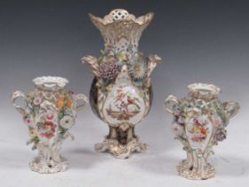 Three Coalbrookdale vases, to include a large vase with painted bird decoration 35cm high and a pair