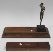 A Deco style bronze elongated figure, 28cm high, a carved desk stand and a mahogany box (3)