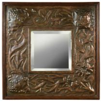 An Arts & Crafts copper wall mirror,