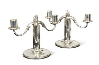 Georg Jensen, a pair of silver twin-branch candelabra,