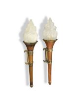 A pair of copper and brass flaming torch wall lights,