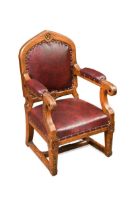 A late Victorian gothic revival oak child's chair,