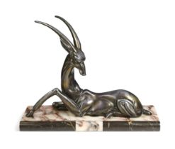 An Art Deco patinated zamac model of an antelope,