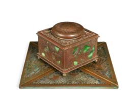 A Tiffany Studios bronze and slag glass inkwell, circa 1915,