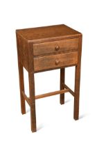 In the manner of Peter Waals, a Cotswold School oak side table, circa 1930,