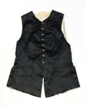 A black satin waistcoat from the MGM wardrobe of David Niven,