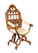 A gothic oak armchair,