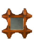 A reformed-gothic mahogany hall mirror,