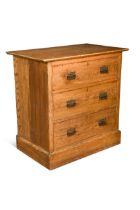 A small Arts & Crafts oak chest of drawers,