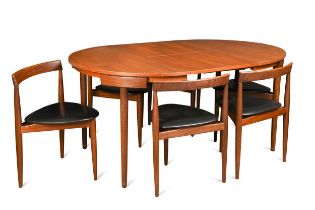 Hans Olsen for Frem Rojle, a Danish teak extending dining table and six hideaway chairs, circa 1965,