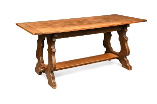 An English Arts & Crafts Basque style oak refectory dining table,