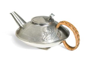 Archibald Knox (1864-1933) for Liberty & Co., an Arts & Crafts Tudric polished pewter teapot,