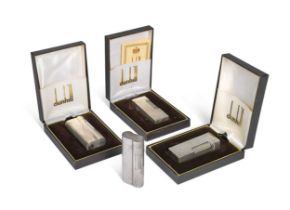 A group of four Dunhill 'S' lighters, three boxed,