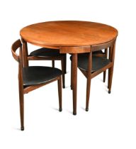 Hans Olsen for Frem Rojle, a Danish teak dining table and four hideaway chairs, circa 1965,