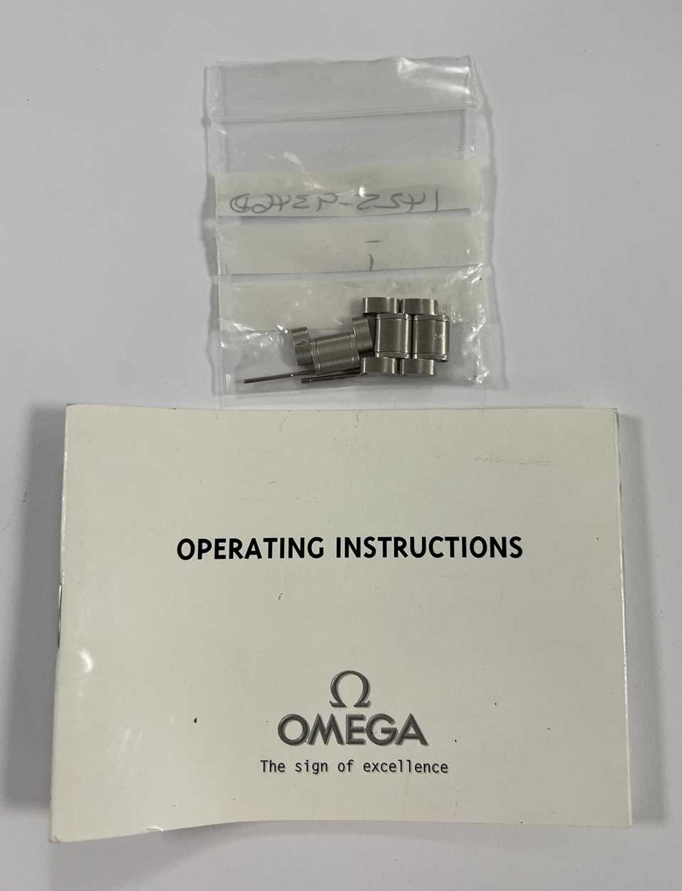 Omega - A steel 'Speedmaster' triple calendar chronograph wristwatch, - Image 10 of 10