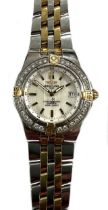 Breitling - A diamond set two-colour 'Starliner' wristwatch,