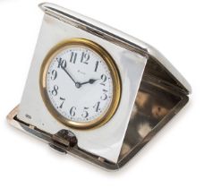 Octava Watch Company, Granges - An early 20th century Sterling silver cased 8 day travelling clock,