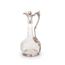 A late 19th century silver plated and glass claret jug,