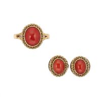 A coral ring, together with a pair of ear studs,