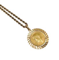 A full sovereign pendant and chain,