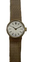 Longines - A 9ct gold wristwatch,