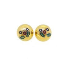 A pair of circular domed ear clips,