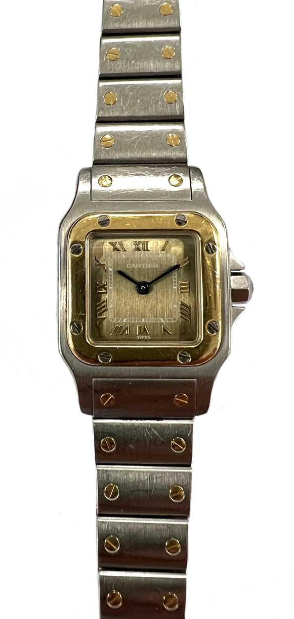 Cartier - A two-colour 'Santos de Cartier Galbée' wristwatch,