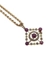 An early 20th century multi stone pendant and chain,