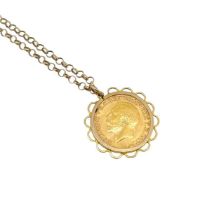 A full sovereign pendant and chain,