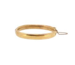 A hinged bangle,