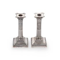 A pair of Victorian silver library candlesticks,