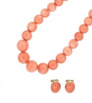 A coral bead necklace, together with a pair of ear studs,