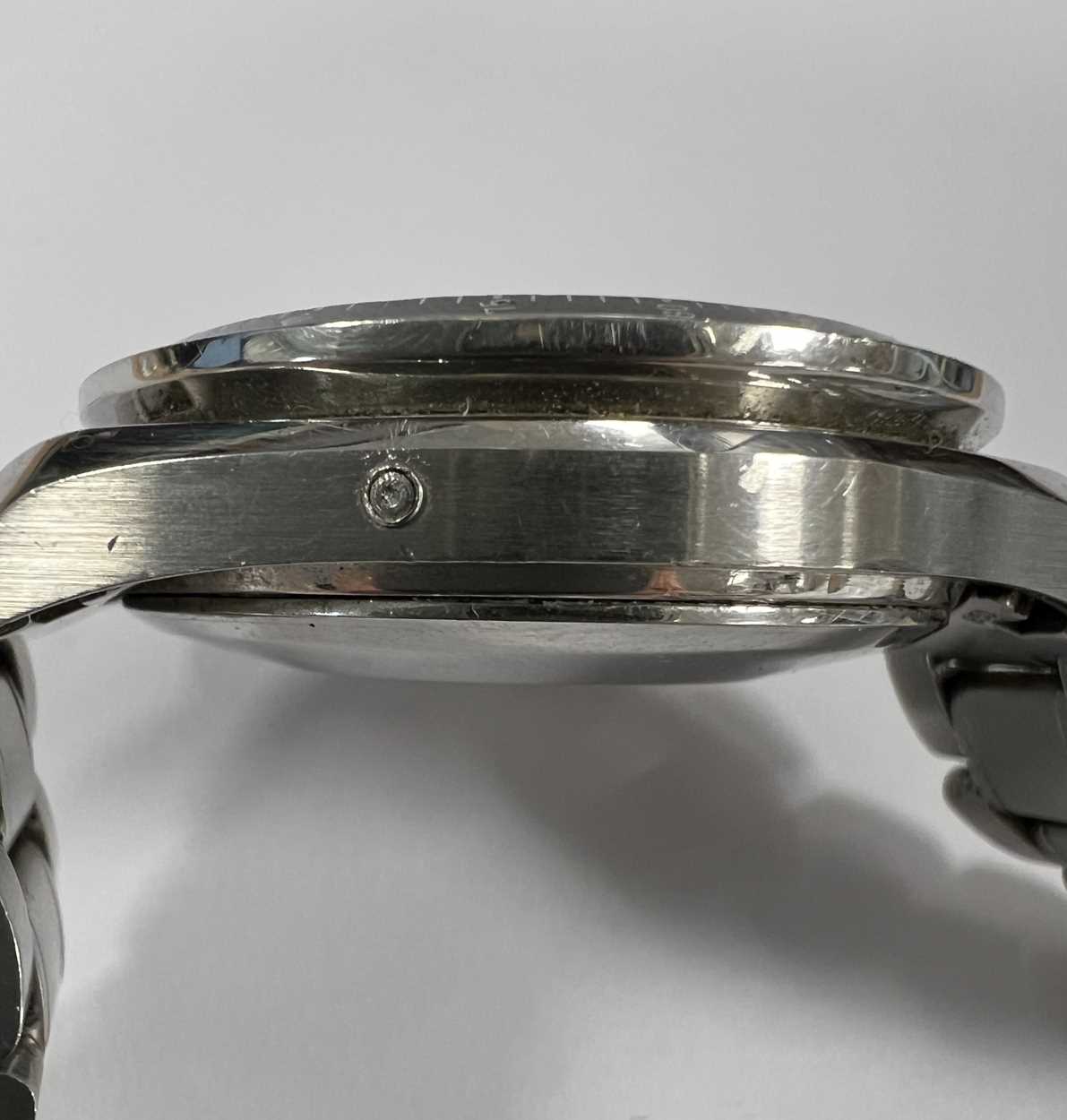 Omega - A steel 'Speedmaster' triple calendar chronograph wristwatch, - Image 4 of 10