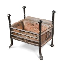 A wrought iron fire basket, 18th century style,