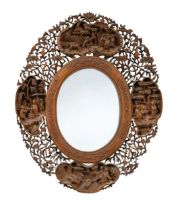 A Chinese export carved and pierced wood oval mirror, Canton, circa 1850,