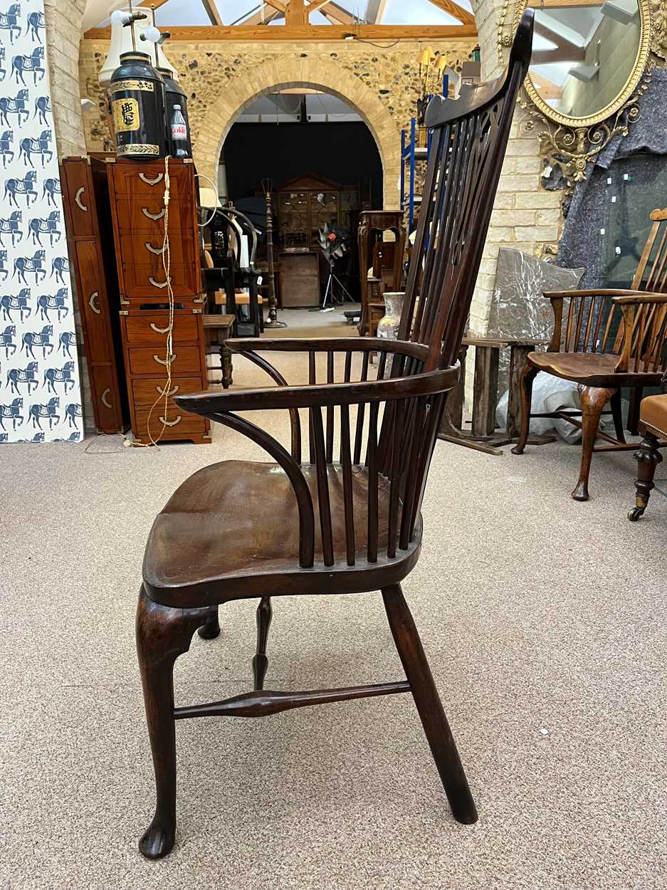 A Thames Valley walnut, fruitwood and elm comb-back arm chair, circa 1800, - Bild 4 aus 12