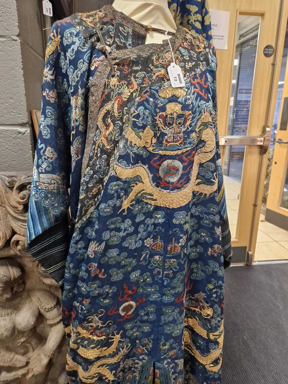 A Chinese embroidered silk blue ground dragon robe, late Qing Dynasty, - Image 14 of 18