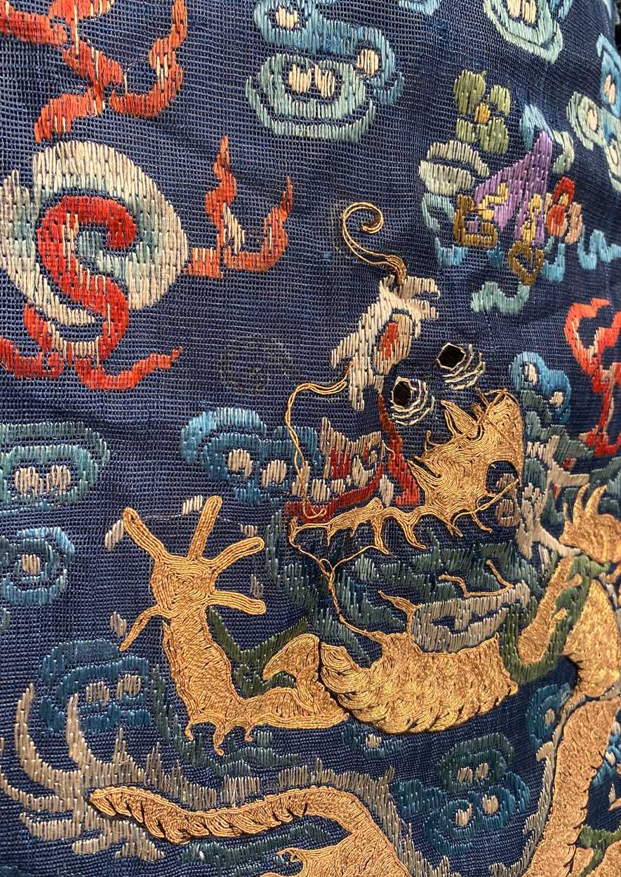 A Chinese embroidered silk blue ground dragon robe, late Qing Dynasty, - Image 5 of 18