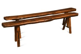 A near pair of yew wood benches, 19th century,