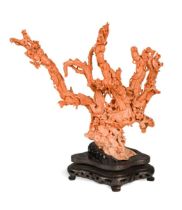 A Chinese large red coral three Guanyin carving, early 20th century,