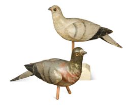 Two carved and polychrome painted pigeon decoys,