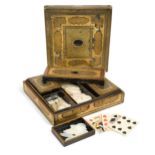 A Chinese export gold and black lacquer games box, Qing Dynasty, circa 1800,